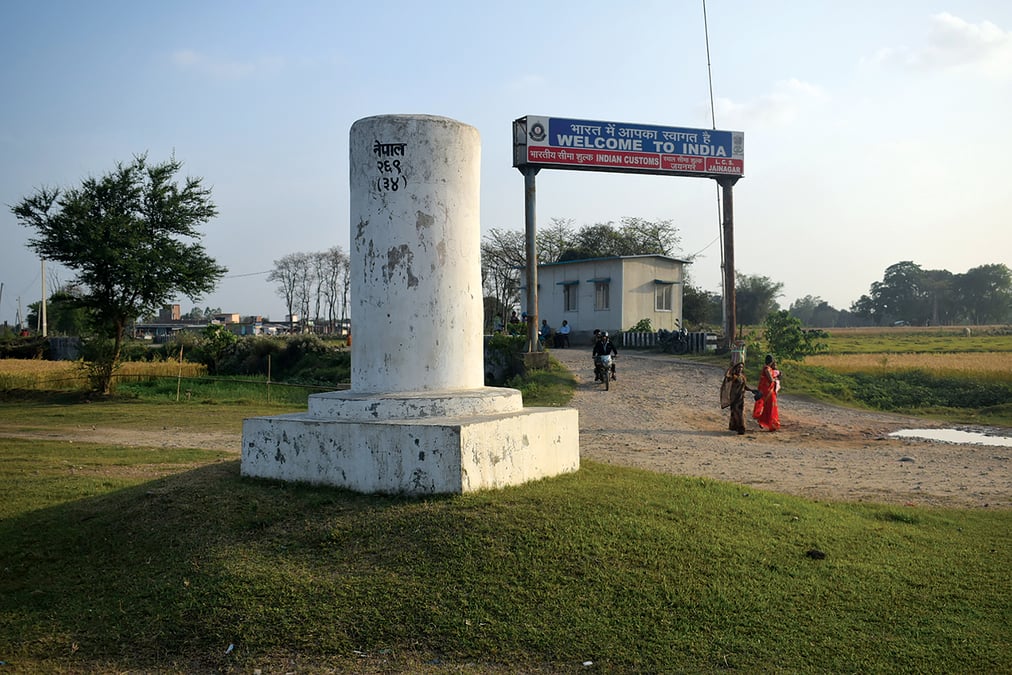 People freely pass across the border at Madar in Siraha district. Photo: SURENDRA KAMATI