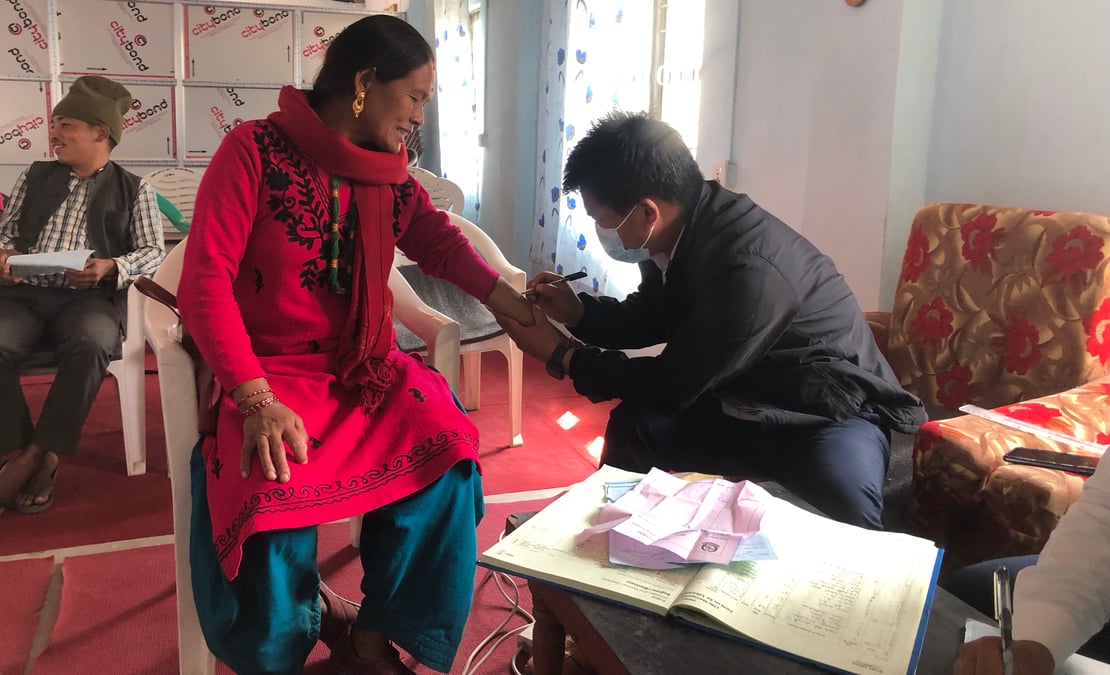 A patient in Piuthan undergoing a test for TB. All photos: BNMT