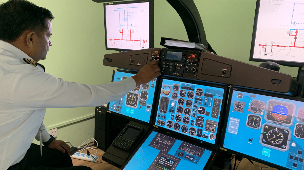 Buddha 2 Captain Manoj KC monitoring the FPT simulator. Photo: KUNDA DIXIT