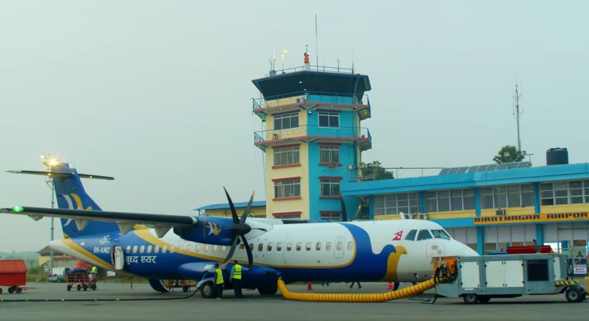 A Buddha Air ATR72-500 being connected to an electric GPU at Biratnagar Airport.