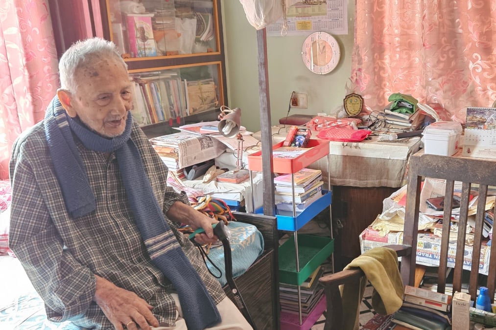 Lil Bahadur Chettri in his book-filled bedroom in Guwahati last month, which he called his "jungle". Photo: RUPA JOSHI