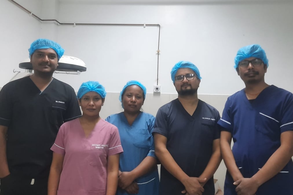 Ashish Poudel (second from right) with the surgical team at Bhojpur district hospital.