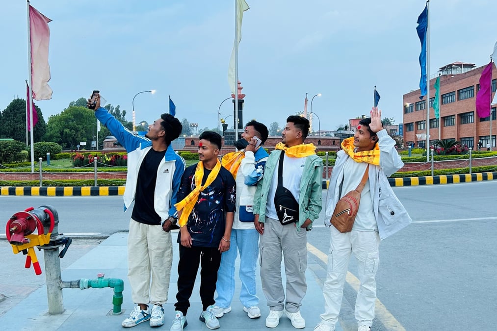 Nepali survivors of the 2023 Jajarkot earthquake who got job placements in Malaysia by an ethical recruiting company before boarding their flight in Kathmandu last year. They did not pay any fees for their jobs. Photos: MIGRATION LAB