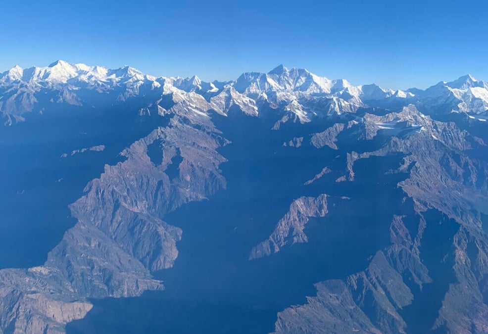 Four 8,000m peaks (Cho Oyu, Everest, Lhotse and Makalu) showing the rapidly receding snowline in the Himalaya. Photo: KUNDA DIXIT