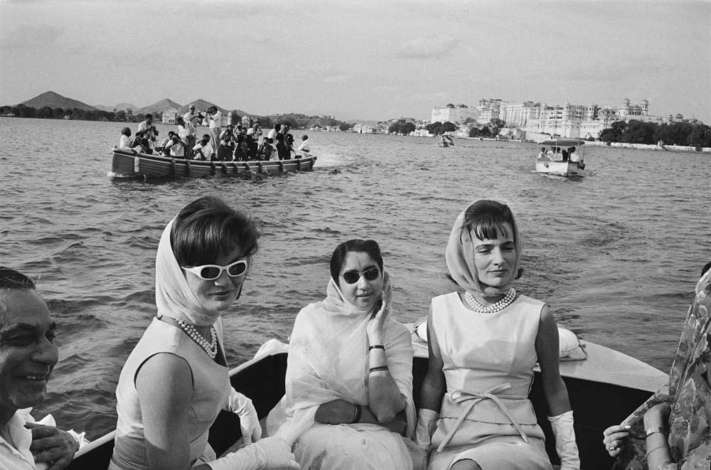 MONOCHROME DAYS: Marilyn's picture of Jacqueline Kennedy, her sister Princess Lee Radziwell and their host the Maharani of Mewar followed by a launch of less-lucky press photographers in Udaipur 1962.