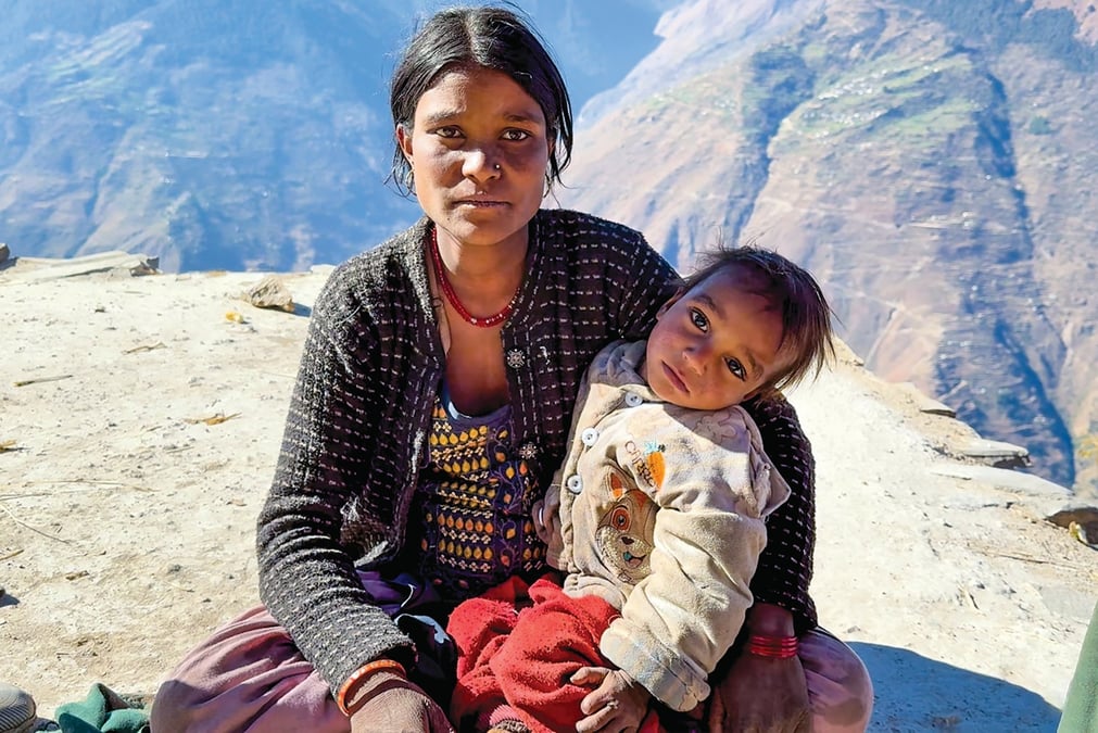 BABE IN ARMS: Hara BK with her 2-year-old malnourished son. She is unable to produce enough milk for her baby, but already pregnant with a third child. Photos: SABINA DEVKOTA
