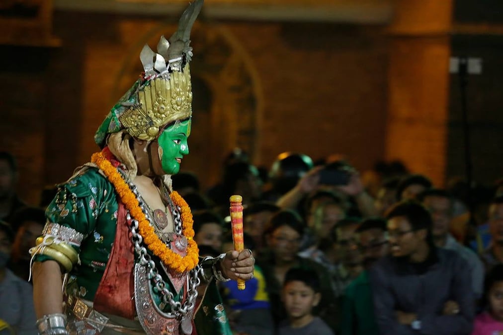 CHARIOTS OF THE GODS: The masked Narāyani leads the Pāhāñ Charey procession in Kathmandu last week. All photos: ALOK SIDDHI TULADHAR