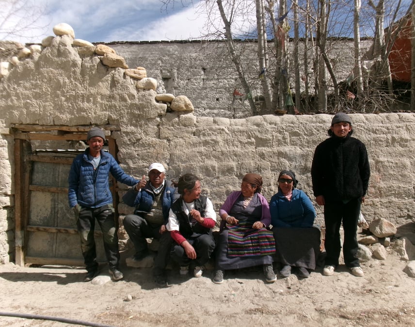 Sonam Tsering, 60 (far left) and Kunga Sanpo, 23 (far right) stand for picture with other locals in Lo Manthang. All photos: ALEXANDRA COLTMAN