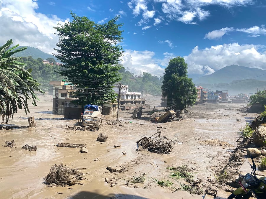 A flash flood in Rasuwa’s Timure and Syabrubesi that originated in Tibet swept through the Bhote Kosi and Trisuli on Wednesday, causing major destruction to settlements and infrastructure downstream in Rasuwa, and Dhading. Pictured is Nuwakot's Dhungebajar along the Trisuli river. Photo: RSS
