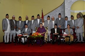 President Bidya Devi Bhandari administers oath of office and secrecy to thirteen new ministers at Shital Niwas on Friday.
