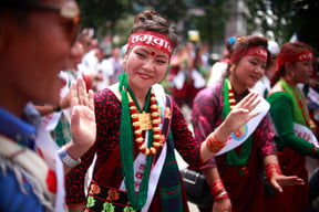 People take part in a rally to mark the International Day of the World's Indigenous Peoples in Kathmandu on Tuesday