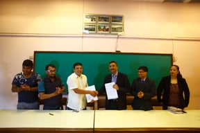 Bikash Karki of the Photojournalist Club and Dip Panday of Shikar Insurance at a press meet announcing health and camera insurance for photo journalists at Nepal Tourism Board, Kathmandu on Wednesday.