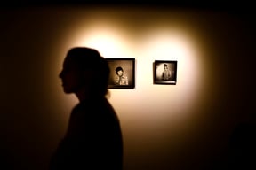 A visitor browses through photographs at an exhibition tracing the history of Nepali Studio Photography in Patan Museum on Monday.