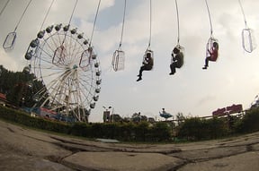 Children on the chair swing ride at Kathmandu Fun Park, Bhrikutimandap on Sunday.