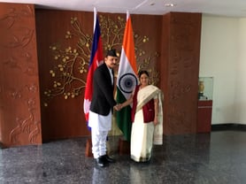 Minister of Foreign Affairs Prakash Sharan Mahat shakes hands with his Indian counterpart Sushma Swaraj in New Delhi on Monday.