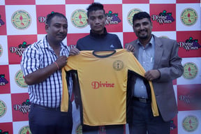 Asiq Thapa Magar(C) captain of Boys Union Football Club pose with Chairman of the club Shatrughan Raj Bhandari(R) and Kishmat Adhikari, Chairman of Shree Mahakali Wine during the announcement of sponsorship deal with the club in Kathmandu on Wednesday.