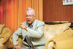 "No government change until constitution written, elections held"
