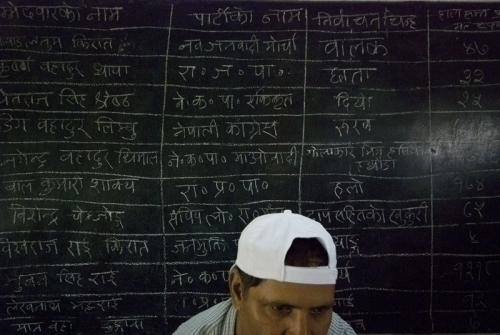 OLD-SCHOOL METHOD: A blackboard is used to record vote counts at the Adarsha Higher Secondary School, the counting centre for Morang district. Counting began at 4 p.m. on Friday and is expected to last till late night Saturday.