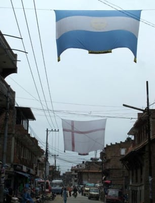 CUP FEVER: The flags of Argentina and England fly over a street in Thimi on Monday as the World Cup fever grips Nepal.