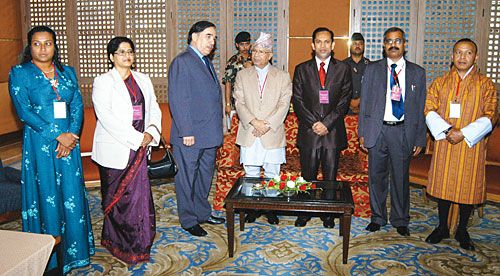 MEET THE NEIGHBOURS: Prime Minister Madhav Nepal poses with South Asian ministers during talks on ending violence against children at the Soaltee, Wednesday.