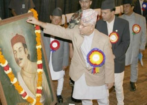 REMEMBRANCE: Caretaker PM Madhav Kumar Nepal pays respect to Bhanubhakta Acharya to mark the 197th Bhanu Jayanti at the National Academy Hall. On the occasion 48 were facilitated for their contribution to arts and literature.