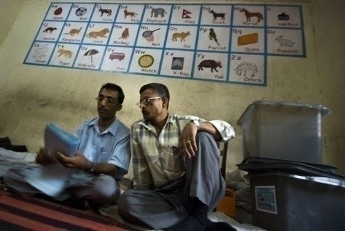 CLASSROOM CHATTER: Counting officials counts ballot in a school converted into a temporary counting centre in Biratnagar.