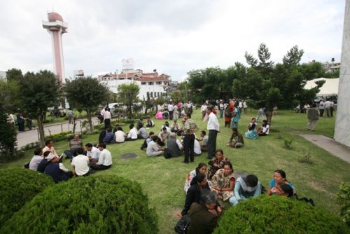 LAZING AROUND: CA members wait outside the parliament building for the session to begin while the parties negotiate a new date for the election. As the Madhesi alliance and the UML have decided to abstain from voting in today's election, both candidates, Pushpa Kamal Dahal of UCPN (Maoist) and Ram Chandra Poudel of NC, were unlikely to secure the required support to win the prime ministership. The session was scheduled at 1 pm, but began only at 7 pm.