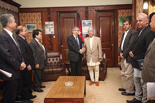 MILLION DOLLAR SHAKE: ADB chief Haruhiko Kuroda meets caretaker PM Madhav Kumar Nepal on Wednesday at Singha Darbar during his four-day visit to Nepal.