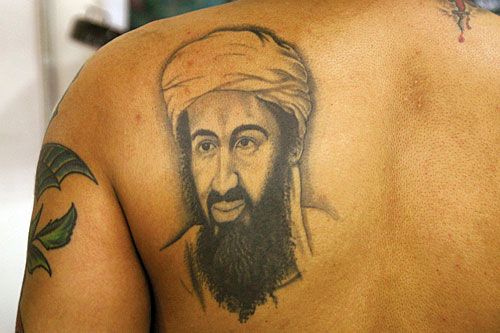 MOST WANTED: A man shows off a tattoo of Osama Bin Laden during the National Tattoo Conference in Kathmandu on Saturday. Over 32 tattoo artists took part in the event.