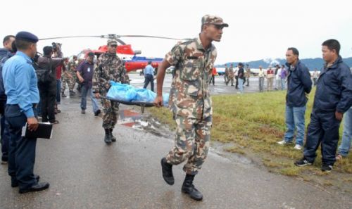 RESCUE OPERATION: A search and rescue team brought the remains of the victims of the Agni Air crash to Kathmandu on Tuesday. A chartered Fishtail Air helicopter was used for the operation.
