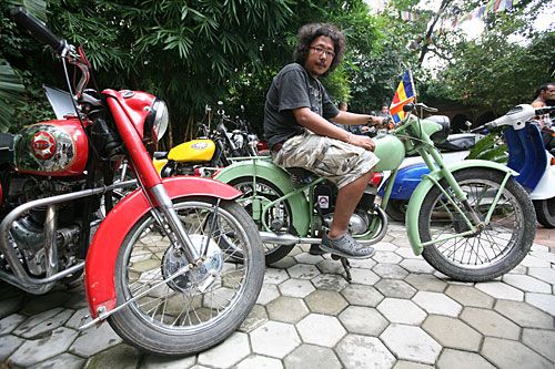 VINTAGE RIDES: Owner of a 1930s BSA Bantam, Mohan Gurung, shows off at the Classic Motorbike Exhibition at Electric Pagoda, Thamel on Saturday. More than 40 bikes were part of the exhibition.
