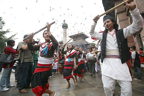 PRETTY MAIDS IN A ROW: Locals dress in traditional Newari attire on Wednesday to celebrate Gai Jatra at Basantapur Darbar Square.