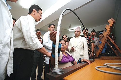 MAKING WAVES: Caretaker PM Madhav Kumar Nepal visited the Spinal Injury Rehabilitation Centre in Sanga on Friday.