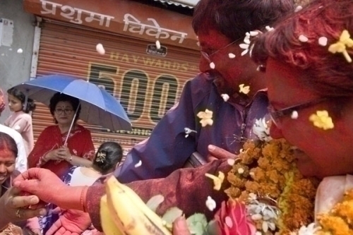 RED ALL OVER: CPN Maoist leader Pampha Bhusal with youth leader Lekh Nath Paudyal on her victory rally in Lalitpur constituency 3.