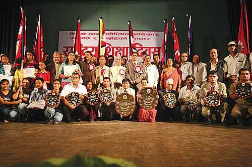 AWARDING EXCELLENCE: Caretaker PM Madhav Kumar Nepal awarded 13 schools for quality education to mark National Education Day and International Literacy Day on Wednesday at Nepal Academy Hall, Kathmandu.