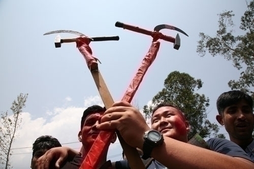 SICKLES AND HAMMERS: Maoists supporters displaying their symbol, at victory rally of Jhakku Prasad Subedi, winner of Kathmandu consituency 2.