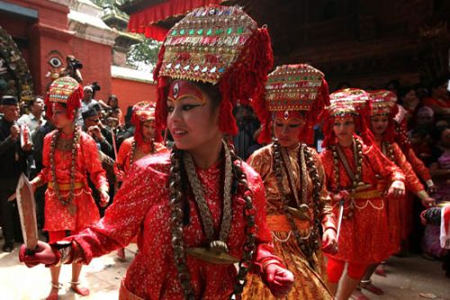 DIVINE POSTURES: Local girls perform Kumari dance at Basantapur on Tuesday, ahead of Indra Jatra celebrations.
