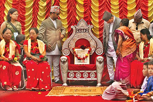 GOD KING: Ex-king Gyanendra's garlanded picture on a throne at the Kumari Temple in Kathmandu. The government advised the king not to attend the traditional blessing ceremony on Tuesday for "security reasons" two hours before the scheduled event.