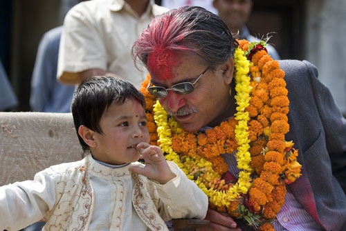 HOT SEAT: Pushpa Kamal Dahal has a word with a young performer during a small Maoist rally at Chobhar, attended by around 100 locals.
