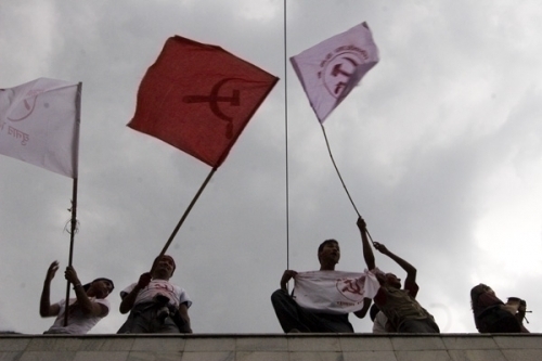 RAIN OR SHINE: Undaunted by the skies thundering above and rain, CPN Maoist supporters continue to cheer their victory in Kathmandu Constituency 10.
