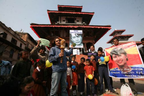 CELEBRATION OF FREEDOM: Nepali human rights activists celebrate Myanmar's pro-democracy leader Aung San Suu Kyi's release in Basantapur on Sunday. Nobel Peace Prize-winner Suu Kyi was freed on Saturday after her latest period of house arrest expired, giving the country a powerful pro-democracy voice just days after a widely criticised election.