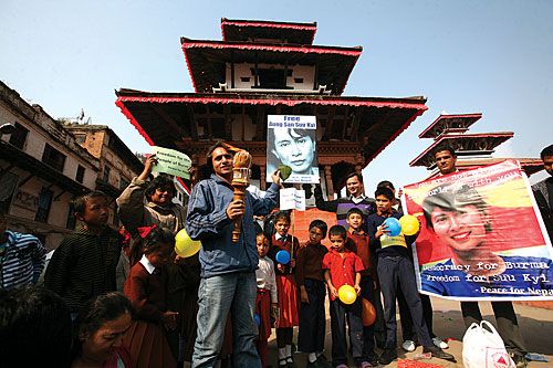 CELEBRATION OF FREEDOM: Nepali human rights activists celebrate the release of Myanmar's pro-democracy leader Aung San Suu Kyi in Basantapur on Sunday. Nobel Peace Prize-winner Suu Kyi was freed on Saturday after her latest period of house arrest expired.