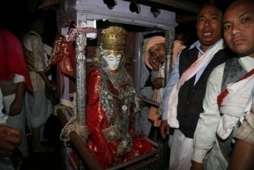 A SIGN: The chariot of Seto Macchendranath toppled over on Saturday evening crushing a bus and injuring 12 people, including two priests. Some people think this is a bad omen. The last time this happened in 2001, the royal family was massacred.
