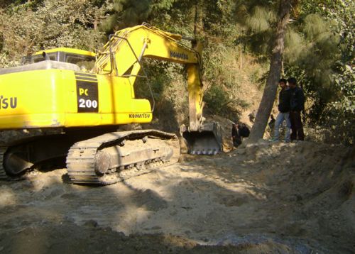 DIG DIG DIG: Work is underway to expand roads around Beni bajar in Myagdi. The locals are happy that once the expansion is complete, they will easily be able to transport their produce to the market.