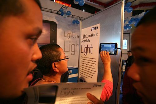 TOUCH GENERATION: A visitor at the ICT Info-Trade 2011 in Bhrikuti Mandap samples ZTE's 7-inch Android tablet on Wednesday. The expo features more than 80 brands and will conclude on Sunday.