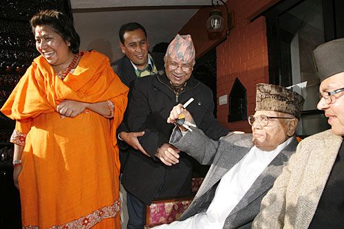 HAPPY BIRTHDAY: Prime Minister Nepal presents a car on behalf of the government to NC leader Krishna Prasad Bhattarai on his 86th birthday at the latter's residence in Bandegaun.