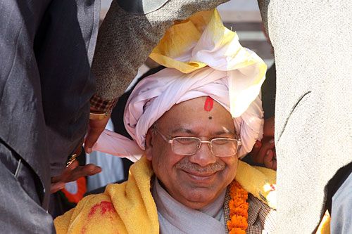 NICE HAT: The Tharu community felicitates PM Madhav Kumar Nepal with a phetta at a program in Tundikhel to celebrate Maghe Sankranti on Sunday.