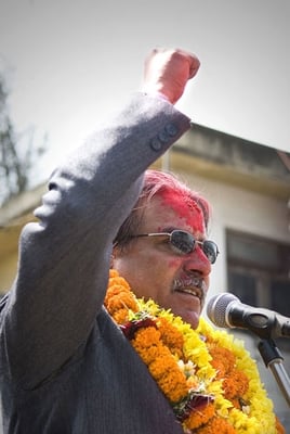 LAL SALAM: Pushpa Kamal Dahal gives the communist salute before commencing his rally speech.