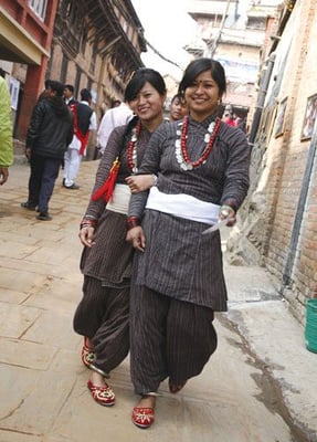 GOING TO A PARTY: Newari ladies head to the five-day Kirtipur Mahotsav that began Wednesday.