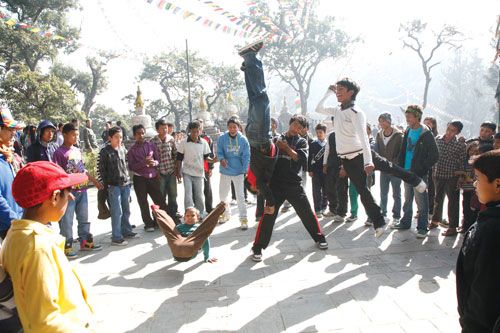 NEVER TOO YOUNG TO BE A BOY: A Kalimati-based b-boying group practices in the premises of Swayambhu Nath, Tuesday.